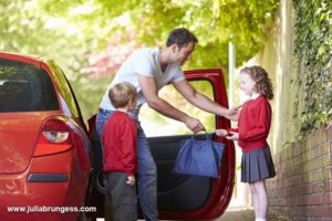 Father-dropping-Children-Off